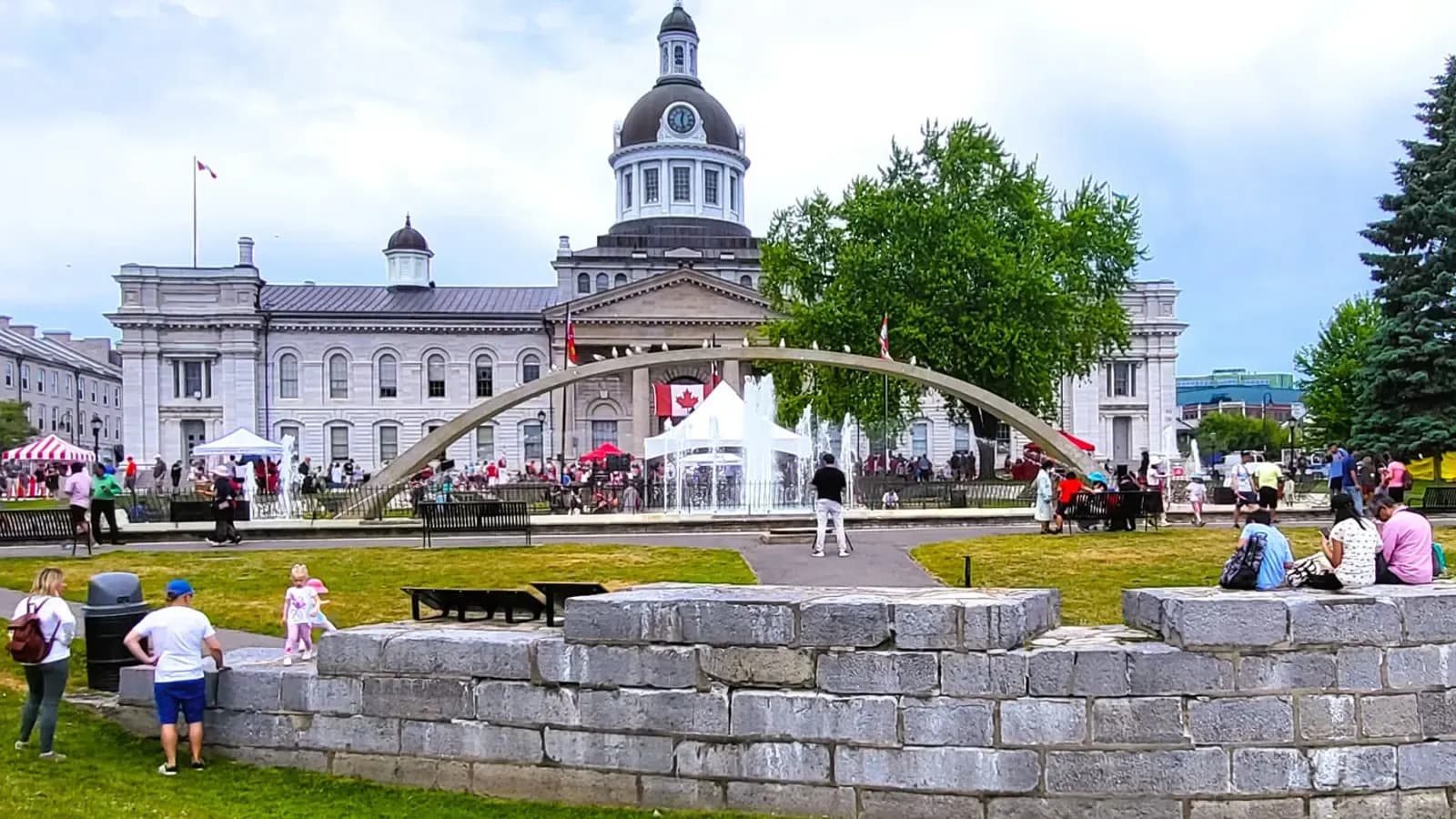 Kingston city hall and fountain with Canadian flag