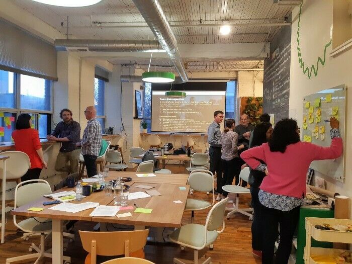 Teams reflecting on how they work at our Agile for Civic Tech workshop.