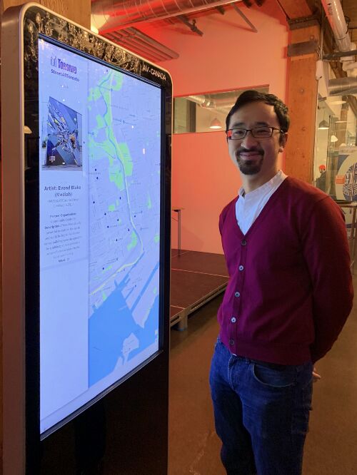 Howard Tam with the interactive display at StART’s networking event.