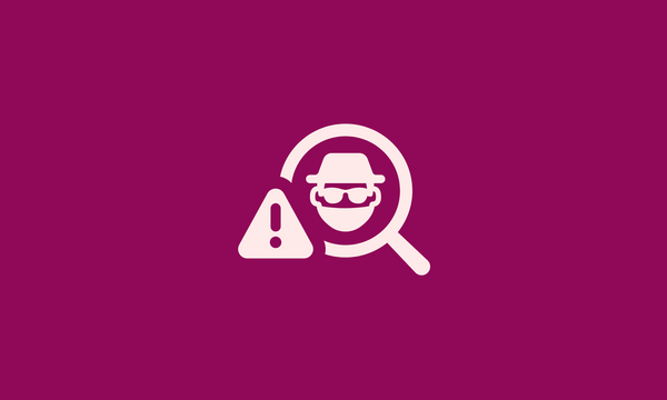 An icon with a magnifying glass and a person in a hat